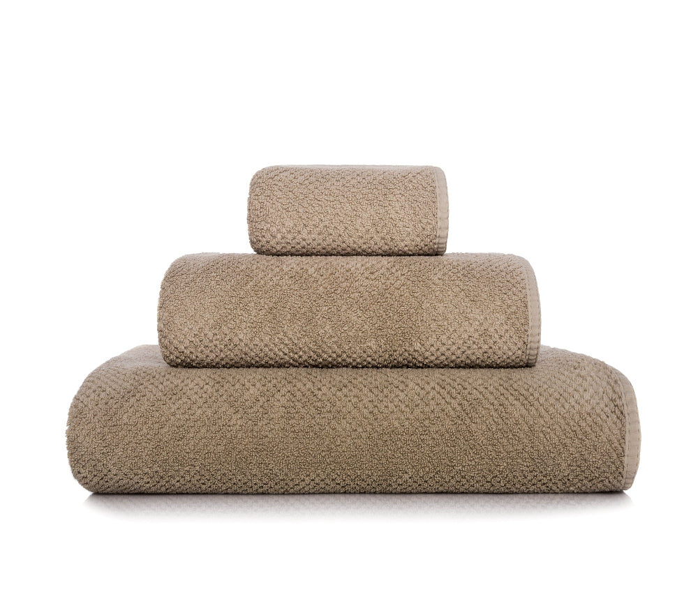 Bee Waffle Face Towels in Stone.