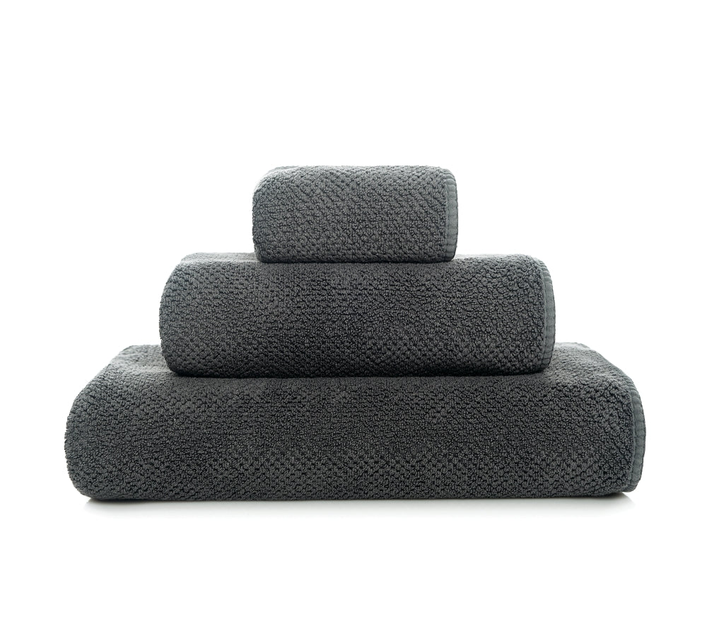 Bee Waffle Face Towels in Storm.