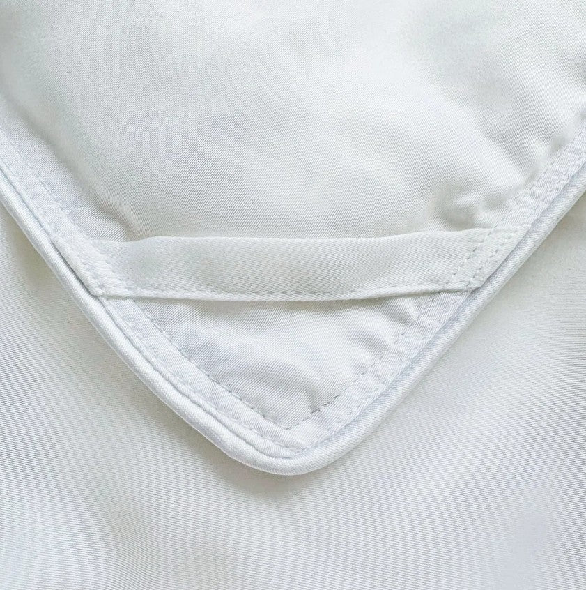 Corner Loops on Luxurious Beds and Linens Duvets and Comforters.