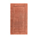 Egoist Bath Rug in Terracotta - at Luxurious Beds and Linens